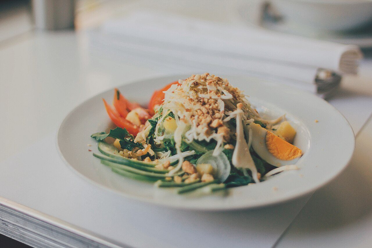 A vibrant salad bowl with fresh greens and vegetables